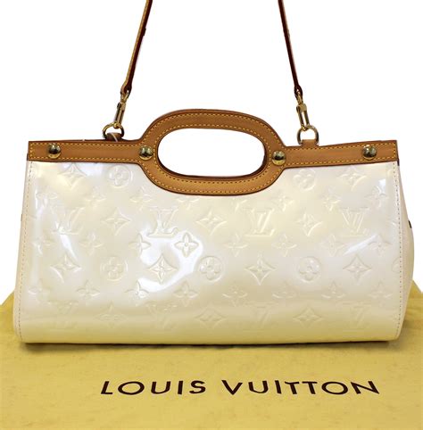 louis vuitton cream shoulder bag|louis vuitton classic shoulder bag.